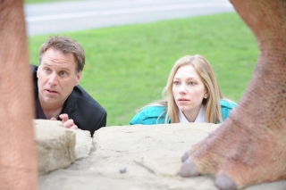 Hiding from a rampaging dino behind a dino. How qauint.