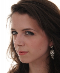 Katie Volkert as The Baroness